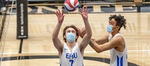 Drew Bennett (center) and Josh White (right) connected for three kills. (photo by Scott Eyre)