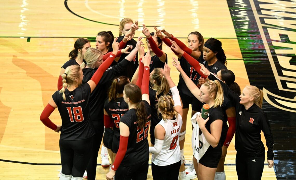 Rutgers Volleyball team huddle at the Towson Invitational