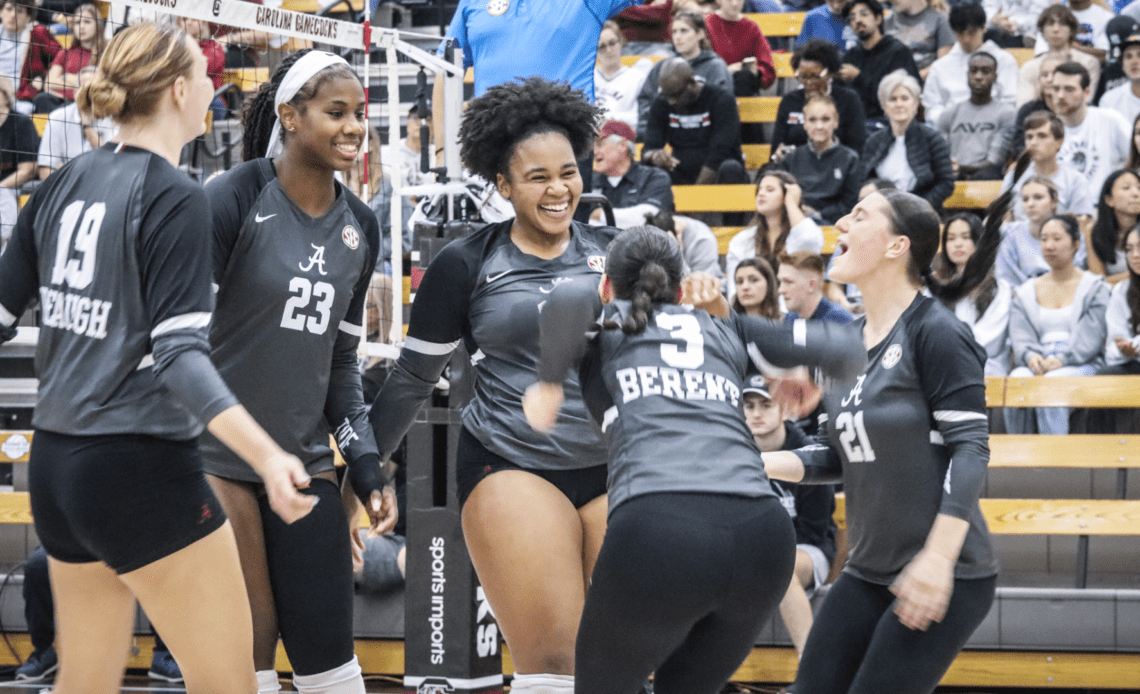 Alabama volleyball player Gabbi LeBlanc celebrates with her teammates after a point vs. South Carolina (Oct. 18, 2023)