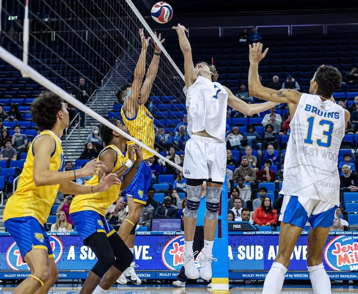 UCLA men's volleyball player Andrew Rowan sets against Fort Valley State in their NCAA match in Westwood, California